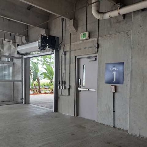 Fortezza Exit Sign in parking garage